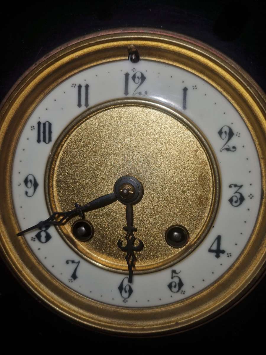 Marble mantle clock works just the chiming system not working  and some of those poles are loose