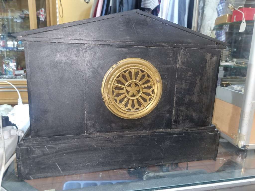 Marble mantle clock works just the chiming system not working  and some of those poles are loose