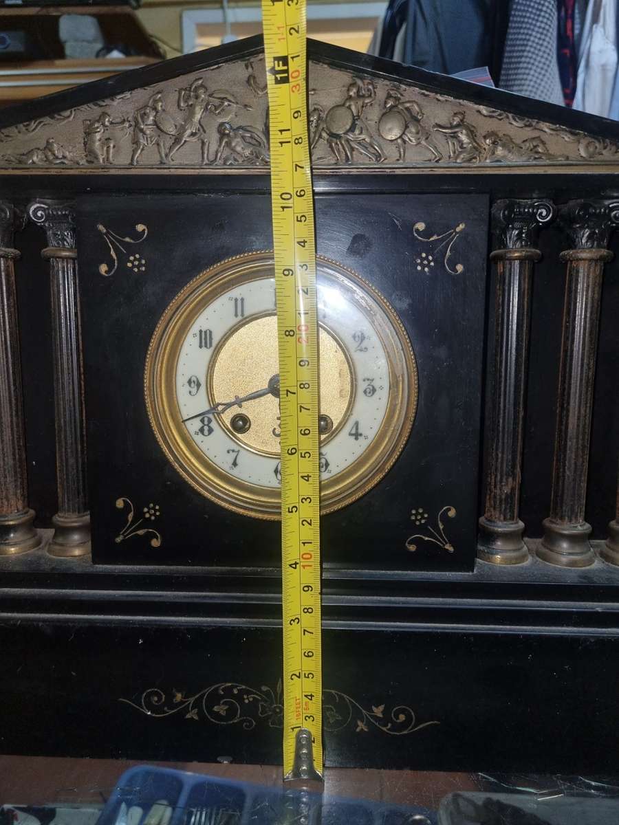 Marble mantle clock works just the chiming system not working  and some of those poles are loose