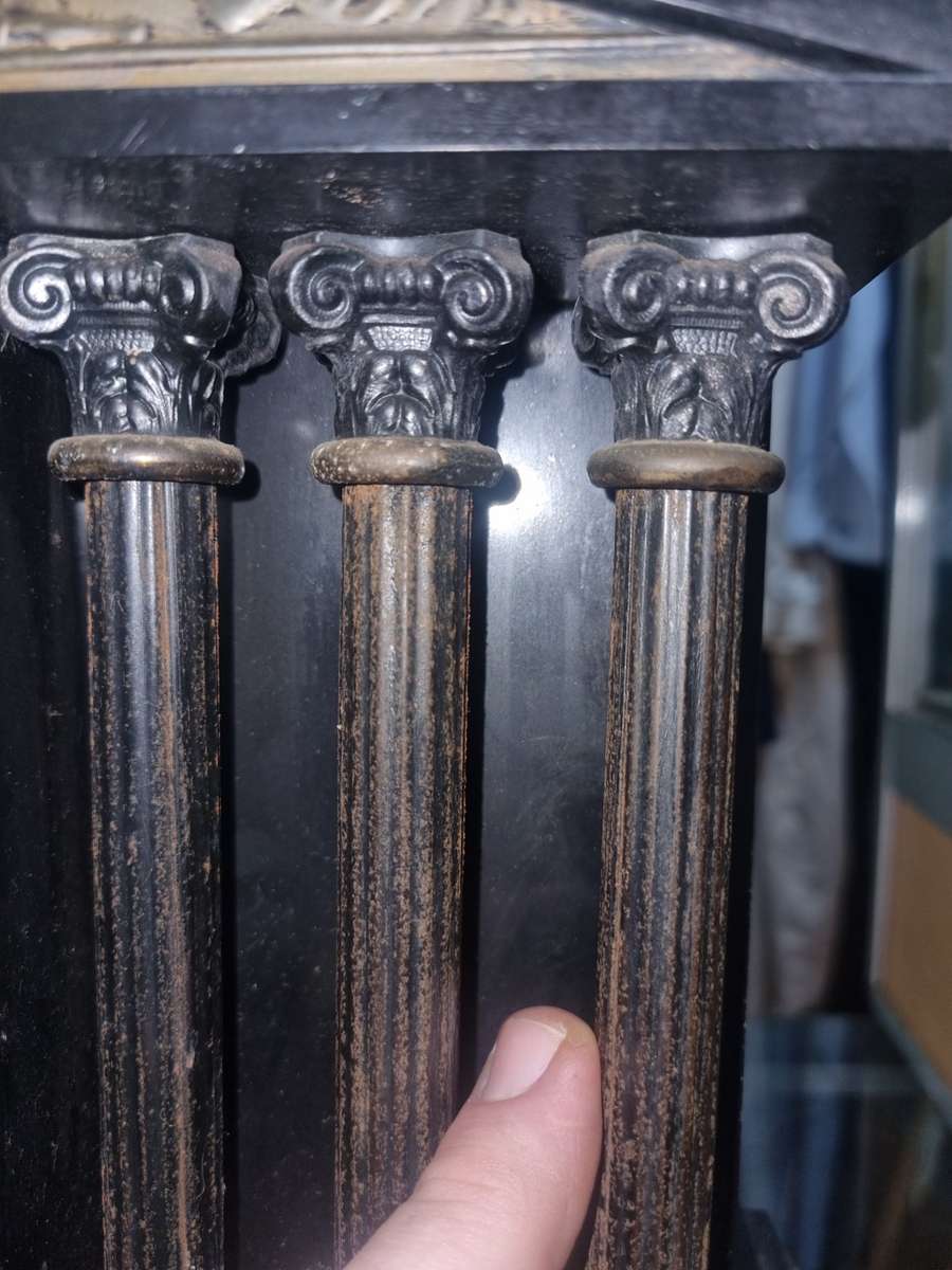 Marble mantle clock works just the chiming system not working  and some of those poles are loose