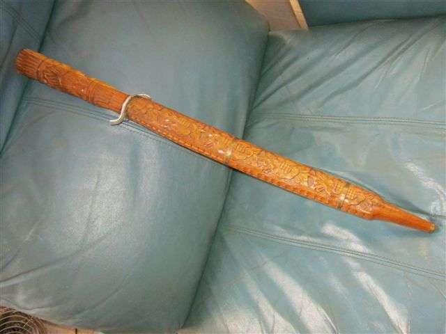 Sword with carved handle and wooden scabbard (Lenght in scabbard 660mm)