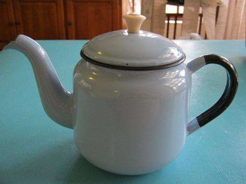 Light blue enamel tea pot