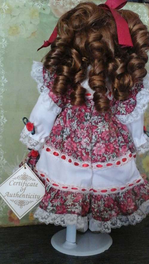 VINTAGE PORCELAIN DOLL