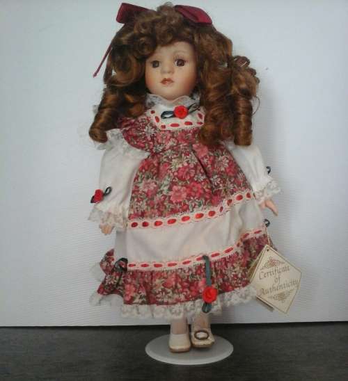 VINTAGE PORCELAIN DOLL