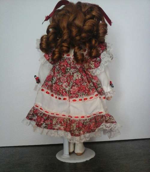 VINTAGE PORCELAIN DOLL