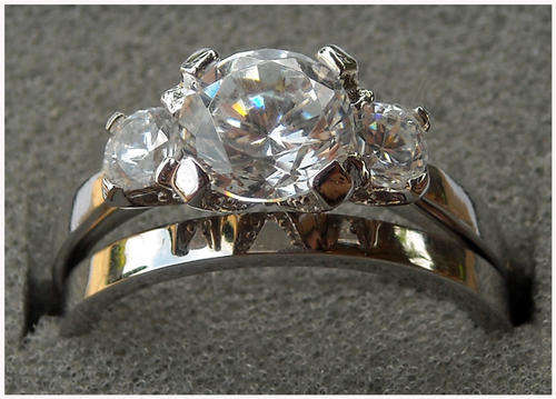 LOCALLY IN STOCK**POSTAGE R35** HALLMARKED STERLING SILVER SIMULATED DIAMOND WEDDING RING SET