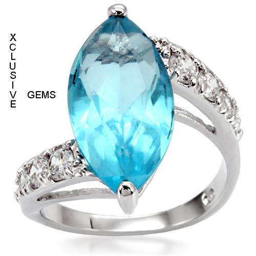 LOCALLY IN STOCK* R35 POSTAGE* 18K WHITE GOLD PLATED SIMULATED BLUE TOPAZ LADIES RING
