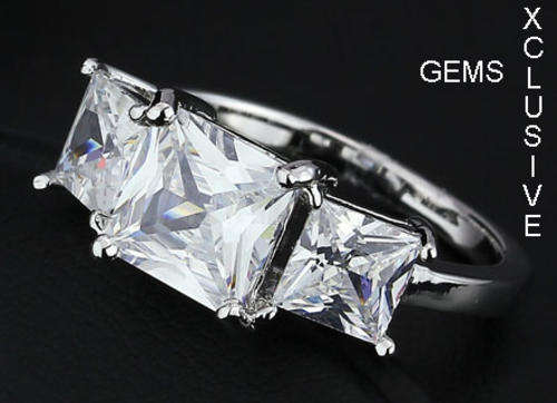 * R35 POSTAGE* 18K WHITE GOLD PLATED SIMULATED DIAMOND LADIES RING