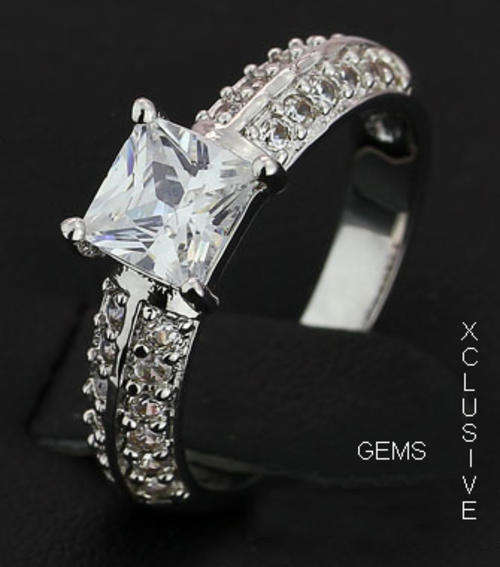 * R35 POSTAGE* 18K WHITE GOLD PLATED SIMULATED DIAMOND LADIES RING