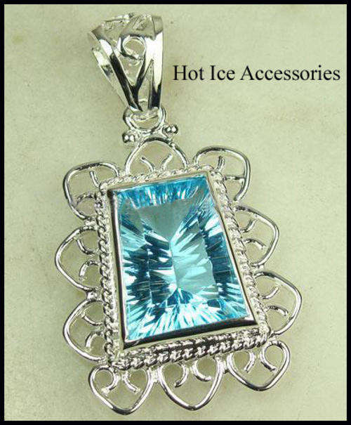 STERLING SILVER GENUINE BLUE TOPAZ PENDANT  - NO COMBINED POSTAGE