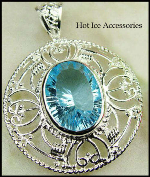 STERLING SILVER GENUINE BLUE TOPAZ PENDANT  - NO COMBINED POSTAGE