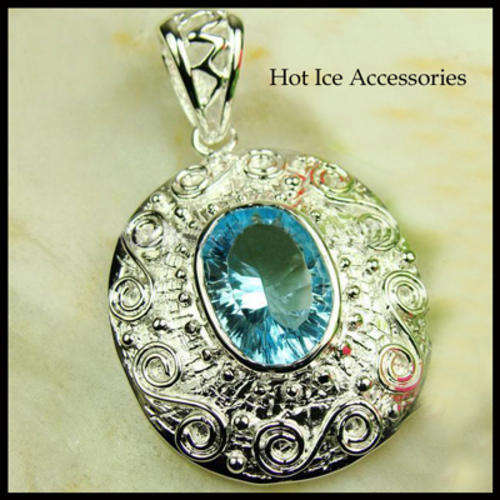 STERLING SILVER BLUE TOPAZ PENDANT  - NO COMBINED POSTAGE