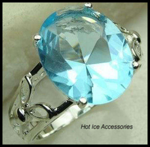 **INTERNATIONAL SHIPPING** STERLING SILVER SIMULATED BLUE TOPAZ RING