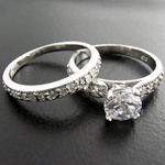 **INTERNATIONAL POSTAGE** STERLING SILVER SIMULATED DIAMOND WEDDING RING SET