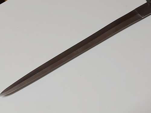 ORIENTAL DAGGER WITH A BRASS/BRONZE EAGLE MOTIF HILT AND A SOLID CHINA STAINLESS STEEL BLADE