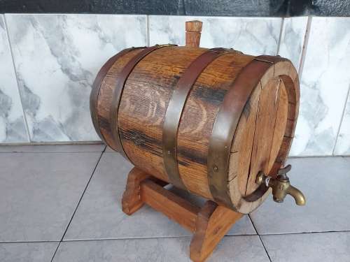 VINTAGE SOLID AND HEAVY OAK WINE BARREL WITH BRASS HOOPS ON A CUSTOM MADE STAND