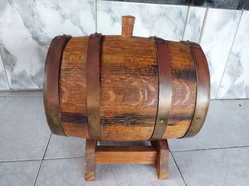 VINTAGE SOLID AND HEAVY OAK WINE BARREL WITH BRASS HOOPS ON A CUSTOM MADE STAND