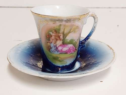 AWESOME RARE VINTAGE VICTORIA AUSTRIA FLOW BLUE CUP AND SAUCER
