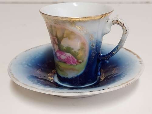 AWESOME RARE VINTAGE VICTORIA AUSTRIA FLOW BLUE CUP AND SAUCER