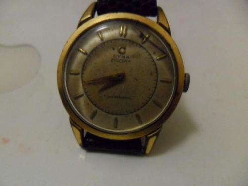 CYMA  TRIPLEX ANTIQUE GENTS WRIST WATCH.