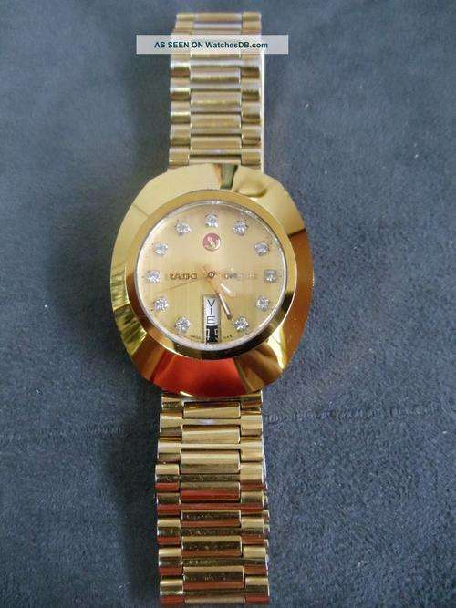 RADO GOLD AND DIAMOND DIASTAR CALENDAR GENTS WATCH.