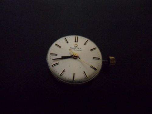 OMEGA  CALIBRE 671  24 JEWELS AUTOMATIC ROSE GOLD MOVEMENT WITH ORIGINAL GOLD CROWN