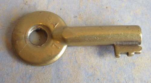 BRASS KEY, DATED 1995