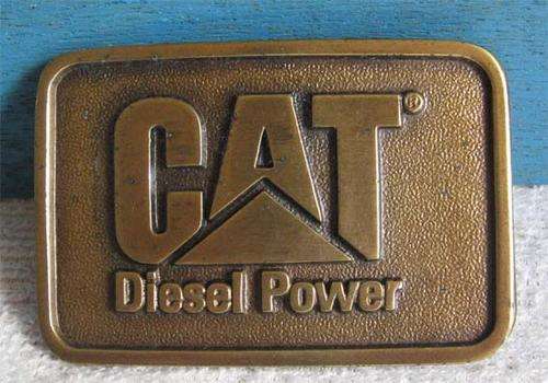 SOLID BRASS "CAT" DIESEL POWER BELT BUCKLE- SIZE 75X50 MM. (BOXED)