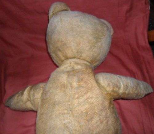 OLD STRAW FILLED TEDDY BEAR -JOINTED