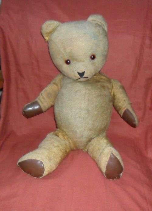OLD STRAW FILLED TEDDY BEAR -JOINTED