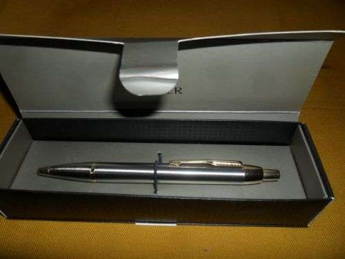NEW PARKER ROLLER BALL  PEN -STAINLESS STEEL WITH GOLD TRIM