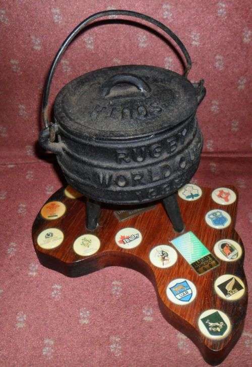 1995 RUGBY WORLD CUP POTJIE POT ON AN AFRICA SHAPED WOODEN PLAQUE