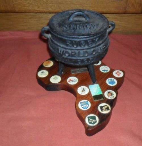 1995 RUGBY WORLD CUP POTJIE POT ON AN AFRICA SHAPED WOODEN PLAQUE