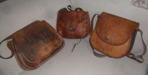 3 LEATHER BAGS DAMAGED  AS IS-ONE BID TAKES ALL