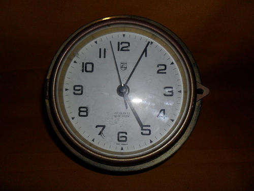 BRASS PORT HOLE STYLED CLOCK - PHILLIPS