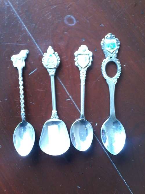 set of collectable t spoons