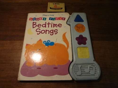 Play a song - Bedtime Songs (hard board sound book) working and excludes batteries