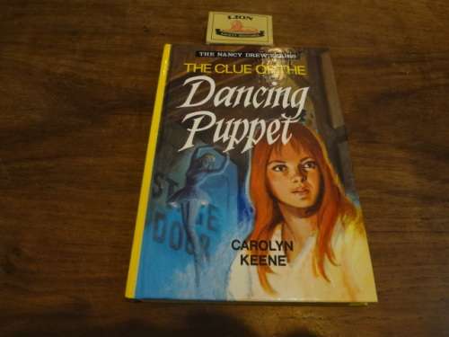 Nancy Drew - The clue of the Dancing Puppet by Carolyn Keene (Collins hard cover)