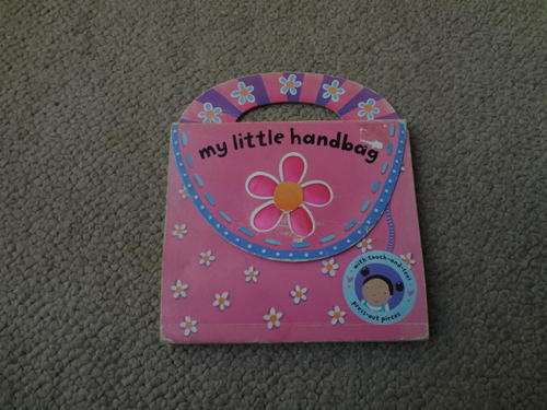 My Little Handbag with touch and feel press-out pieces (one piece missing) (hard board book)