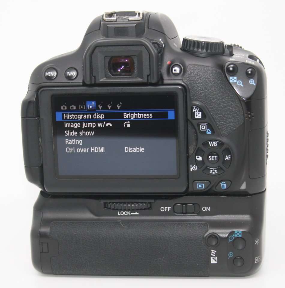 CANON EOS 650D, 18MP DSLR ,FULL HD MOVIES, 18-55MM IS ZOOM LENS , BATTERY GRIP WITH 2 BATTERIES