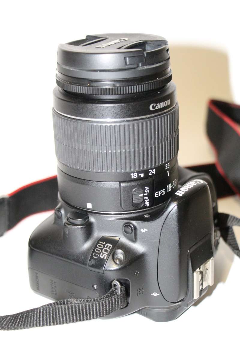 CANON 100D 18MP DSRL FULL HD MOVIES WITH 18-55MM LENS , CHARGER VERY GOOD CONDITION