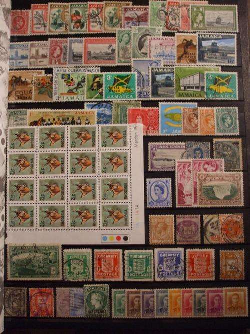 Black Page stock book with 1130+ Stamps HIGH CV!!!!!