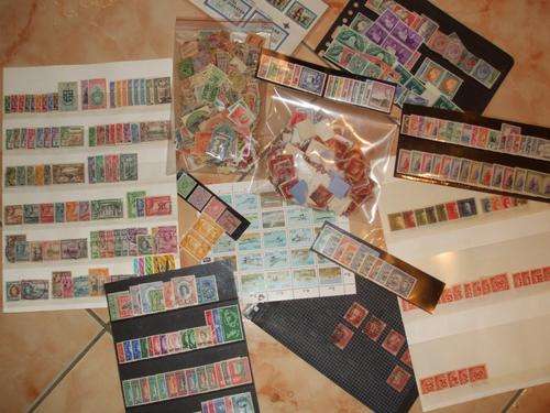 Stunning Collection of 1000+ Mint and used world stamps HIGH CV!!!!!!!!!
