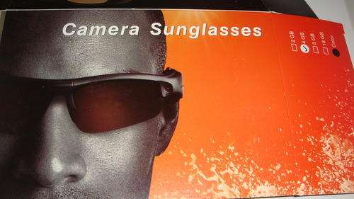 CRAZY AUCTION, 4G internal memory, 2M meaga camera + Remote Control sunglasses with MP3