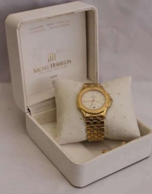 A STYLISH GOLD PLATED MICHEL HERBELIN "SAFARI" GENTS WRIST WATCH IN BOX. EXCELLENT CONDITION