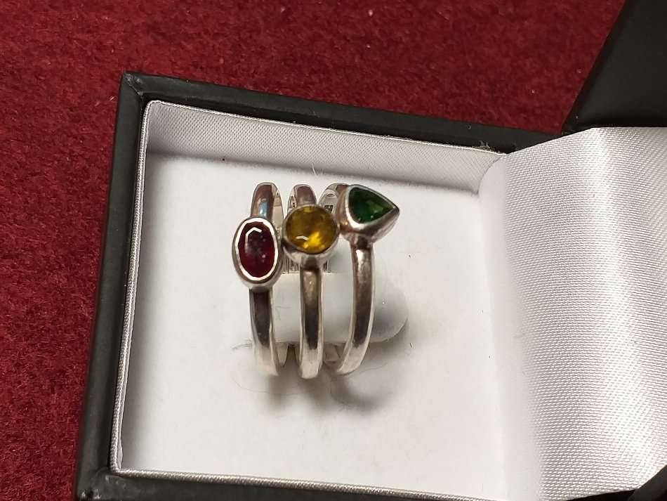 A LOVELY SET OF THREE INDIVIDUAL SOLID STERLING SILVER RINGS