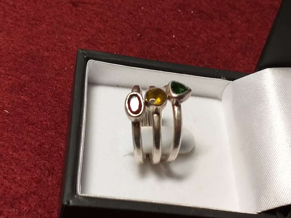 A LOVELY SET OF THREE INDIVIDUAL SOLID STERLING SILVER RINGS