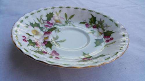 A MAGNIFICENT 14CM ROYAL ALBERT CHRISTMAS ROSE SAUCER!!!!!!! CHIPPED.
