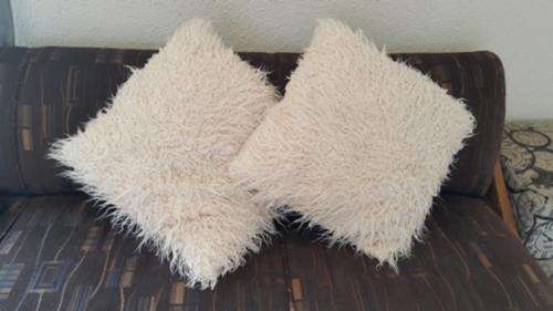 ENHANCE YOUR LIVING AREA WITH THESE TWO BEAUTIFUL WHITE ROUGH "FUR" SCATTER CUSHIONS!!!!!