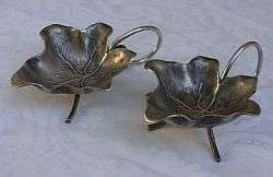 An early pair of salts marked EPNS - leaf shaped